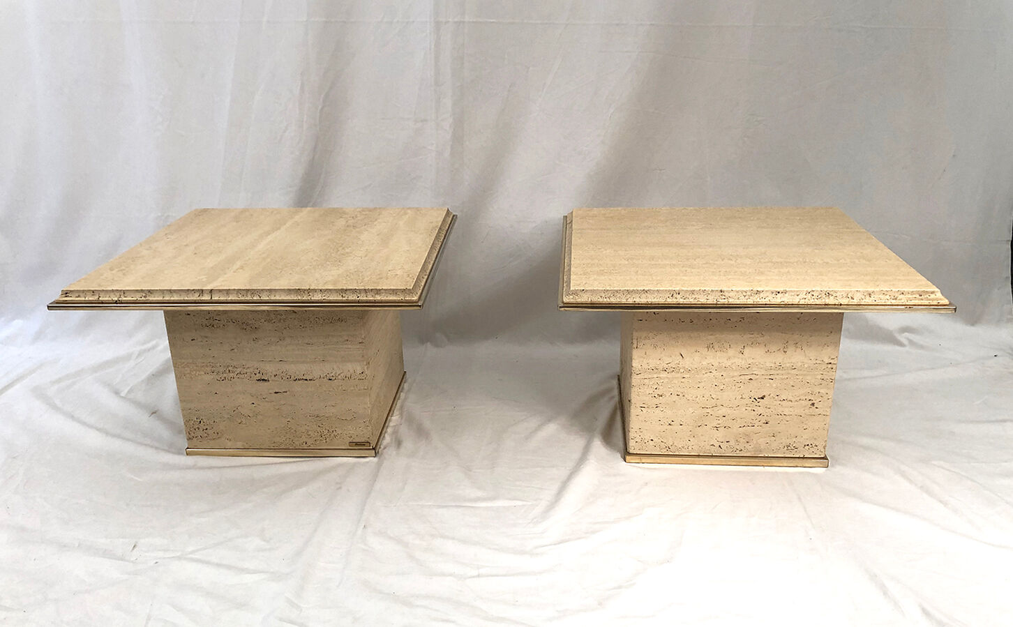 Pair of sofa ends in travertine