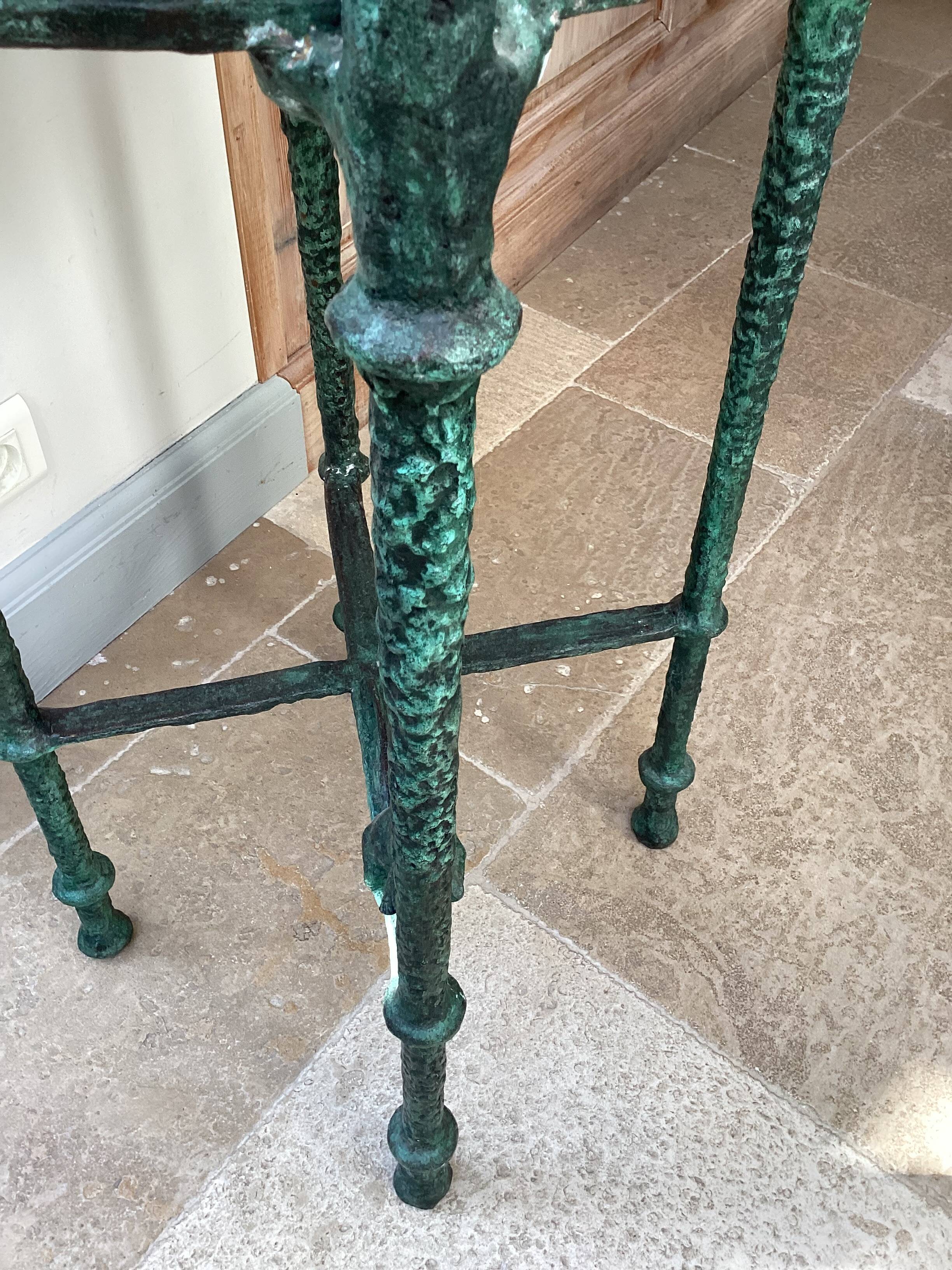 Pair of patinated bronze stools in the spirit of Giacometti.