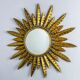 Midcentury modern sunburst wall mirror – gilt metal, France 1960s