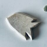 Travertine fish pocket emptier