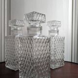 3 diamond-patterned chiseled glass carafes