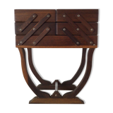 Worker on wooden feet