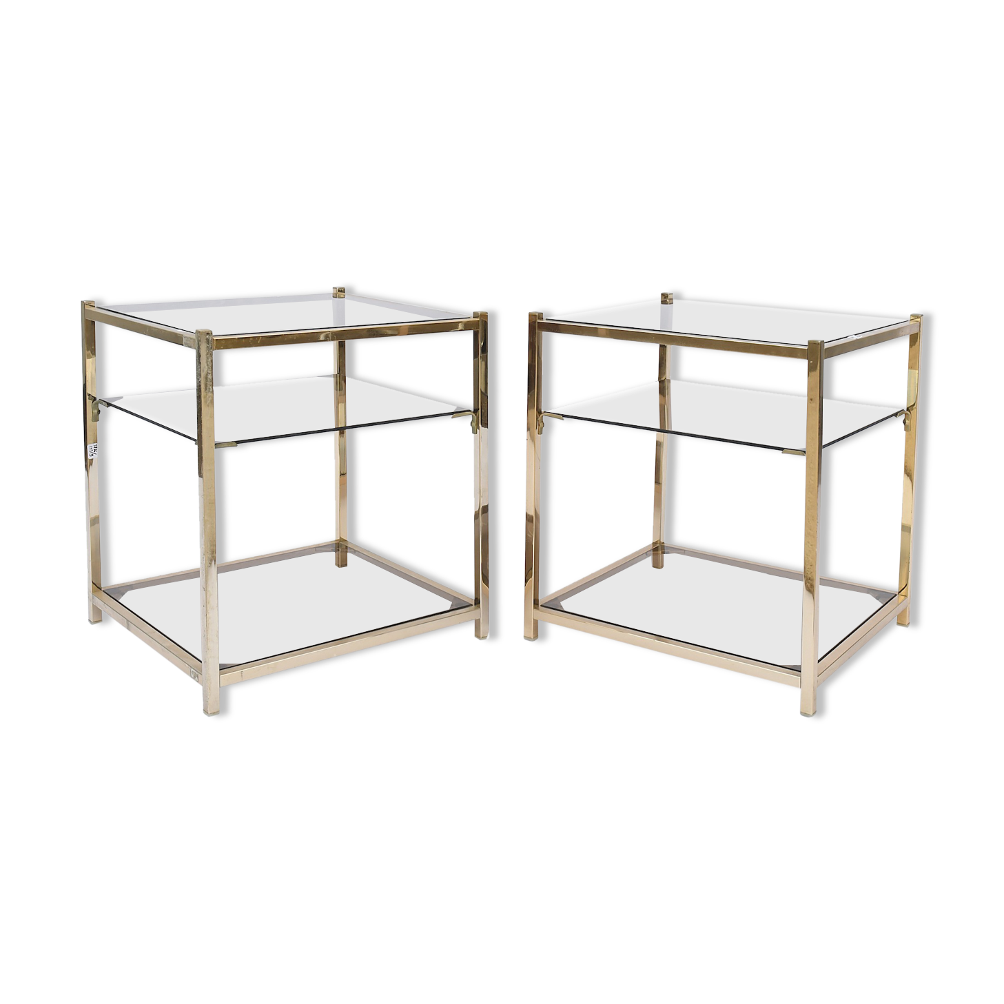 Pair of sofa tips in gilded metal and glass