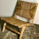Low armchair in raw teak with seat and mulched backrest