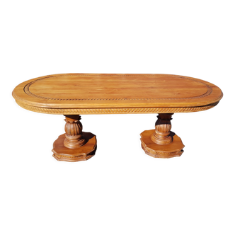 Oval dining table in solid teak