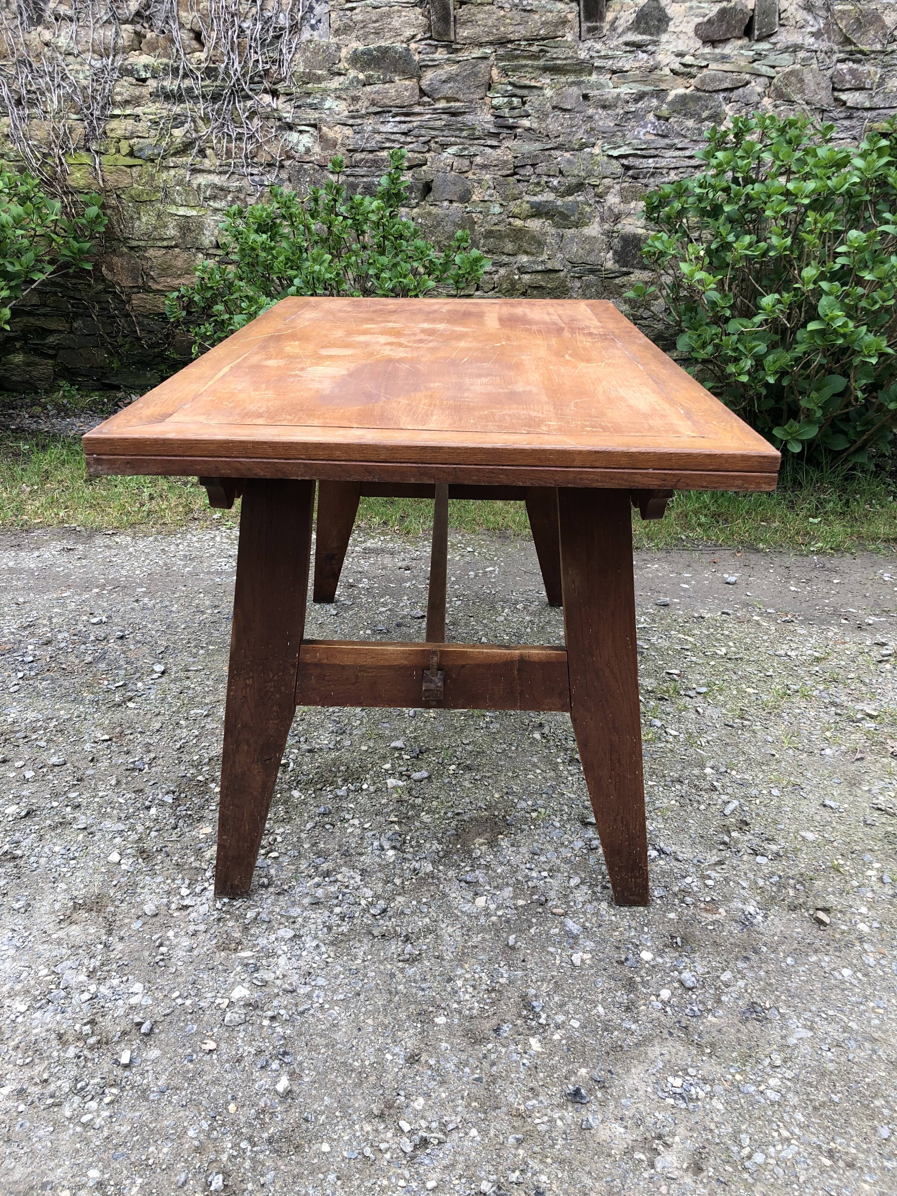 Vintage René Gabriel oak table from the reconstruction period.