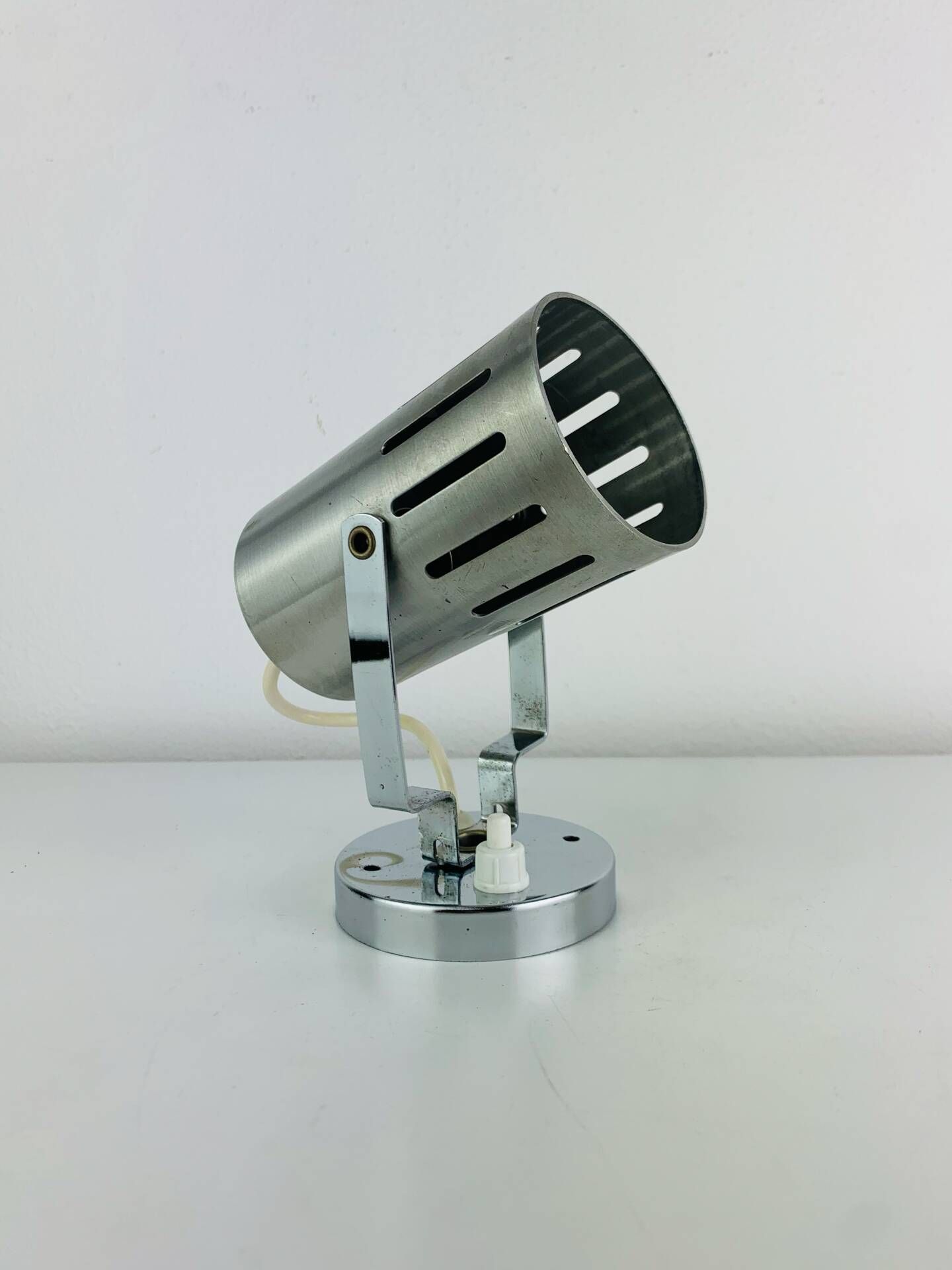 Aluminor wall light, brushed aluminium and chrome, 1960s.