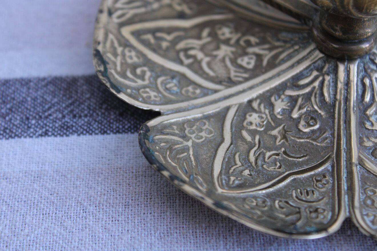 Gold metal candle holder