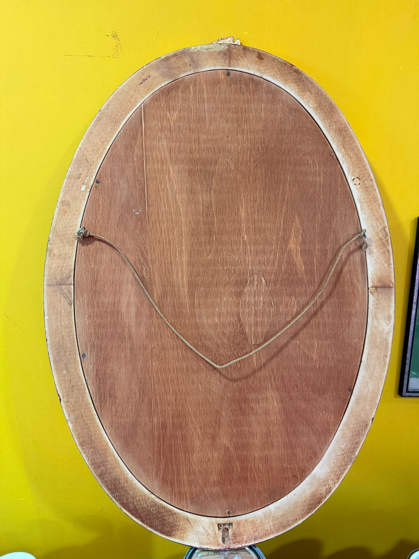 Gold oval mirror refurbished with a pediment — Louis XVI / Napoléon III style