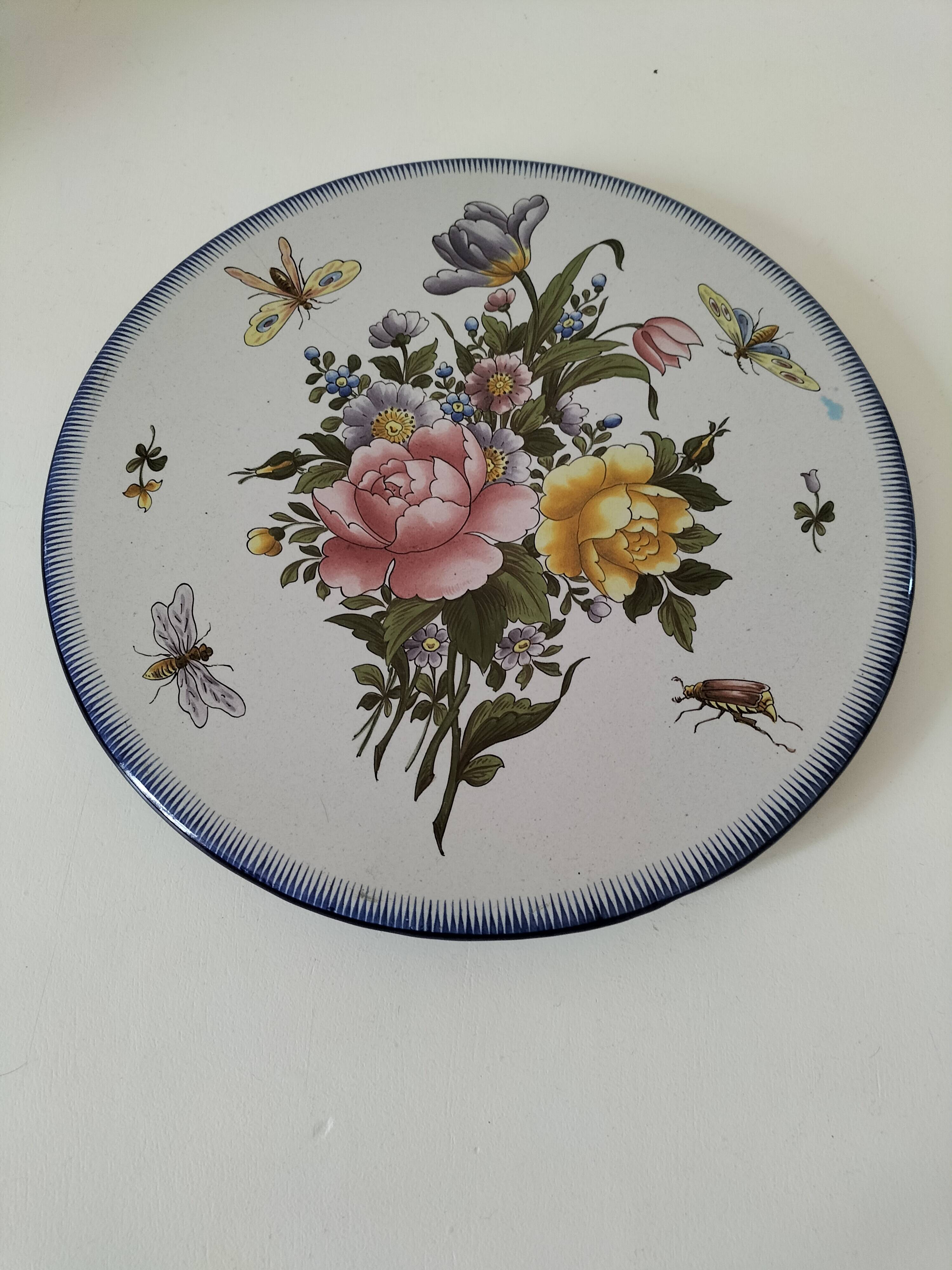 Decorative earthenware plate signed Charolles