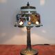 Vintage lamp in brass and ceramic. Flowering tree of life.