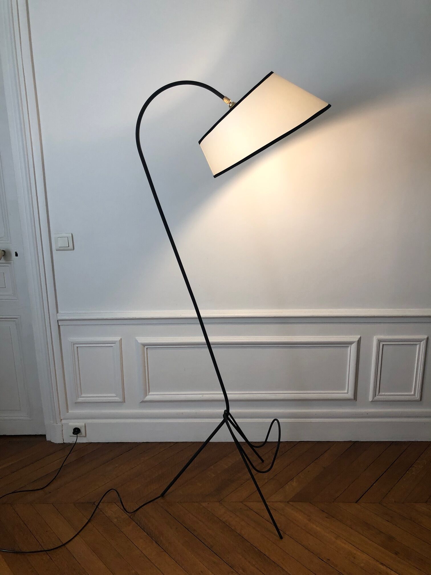 Tripod floor lamp and magazine door 1950