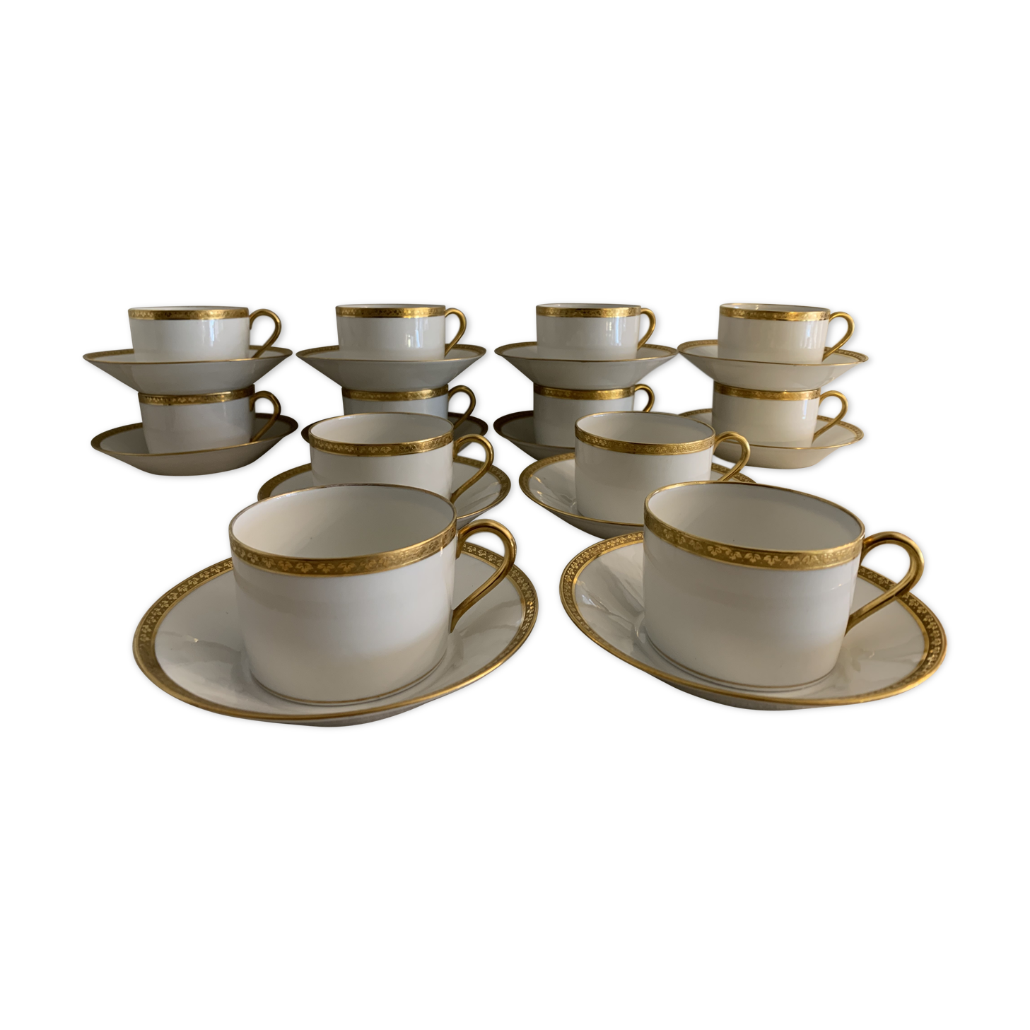 12 coffee cups and 12 white porcelain cups of Gold Gold Limoges