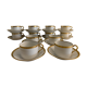 12 coffee cups and 12 white porcelain cups of Gold Gold Limoges