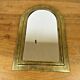 Vintage golden half-moon mirror