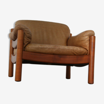 Teak and leather club armchairs