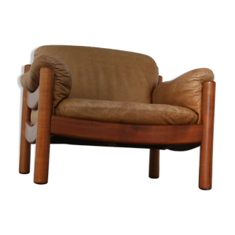 Teak and leather club armchairs