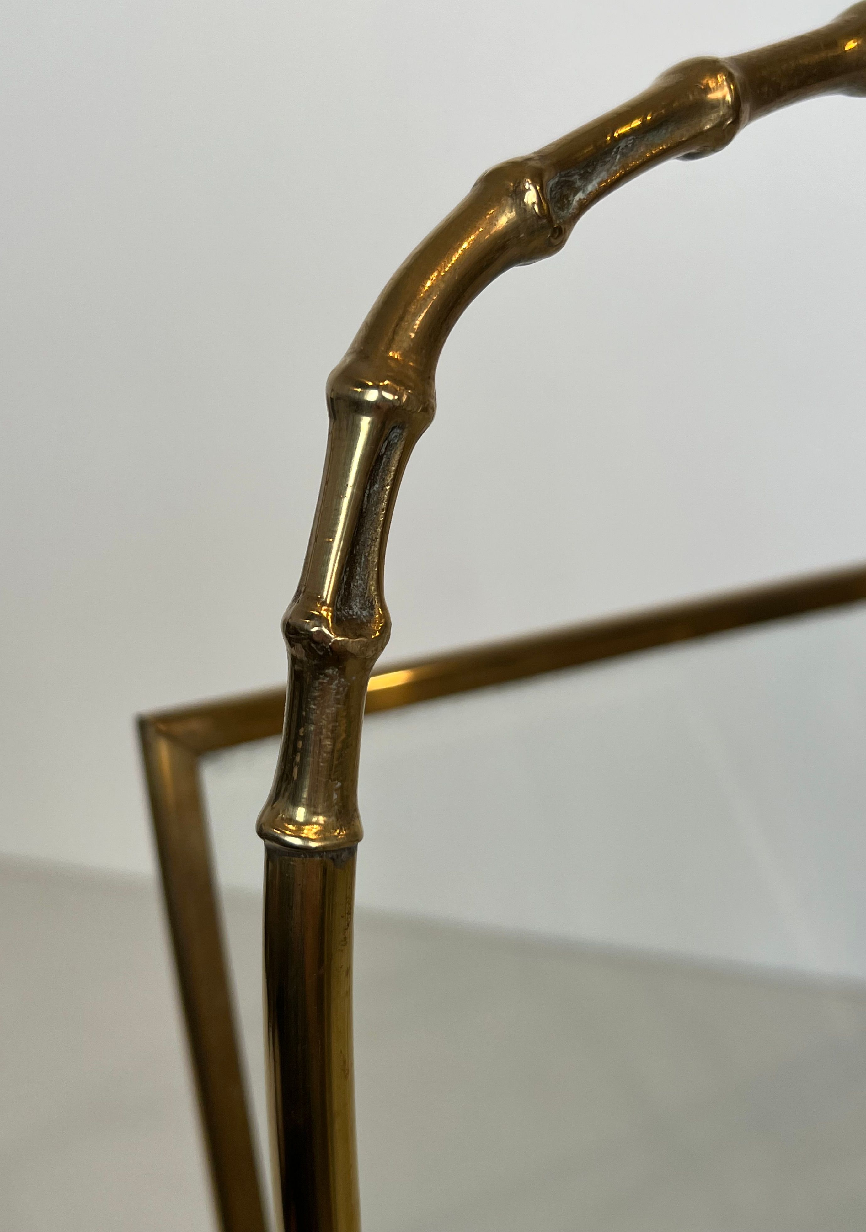 Bronze and brass faux-bamboo magazine rack by the Baguès house.