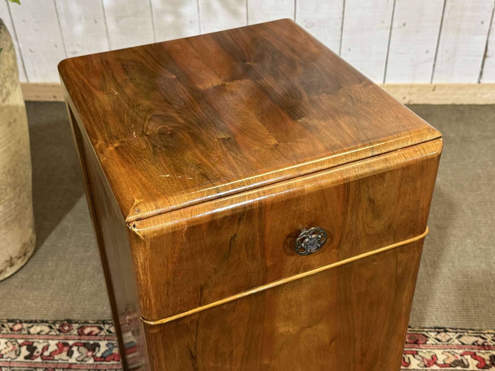 English Art Deco bedside table from the 1950s in walnut.