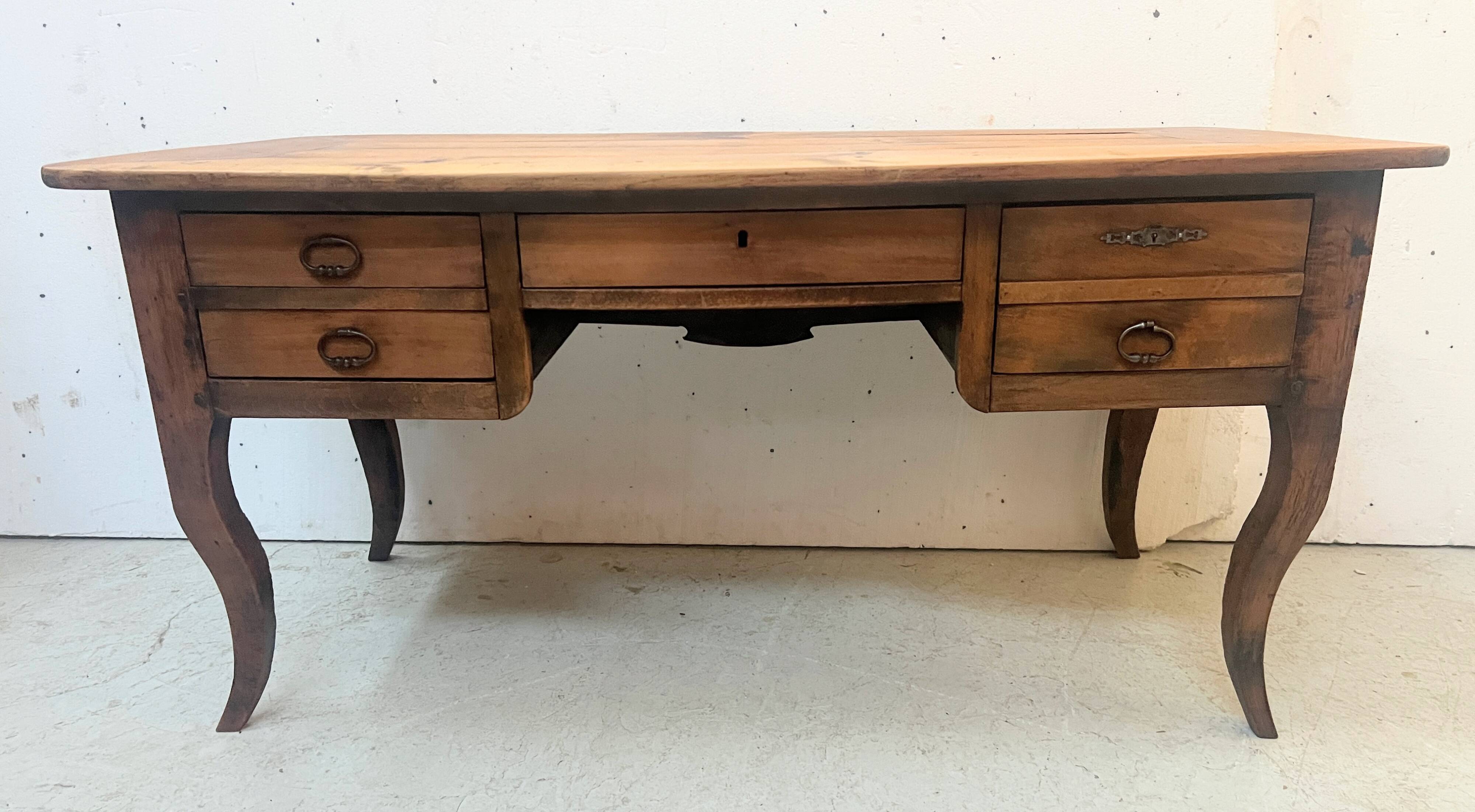 Provincial desk made of solid cherry wood, 20th century.