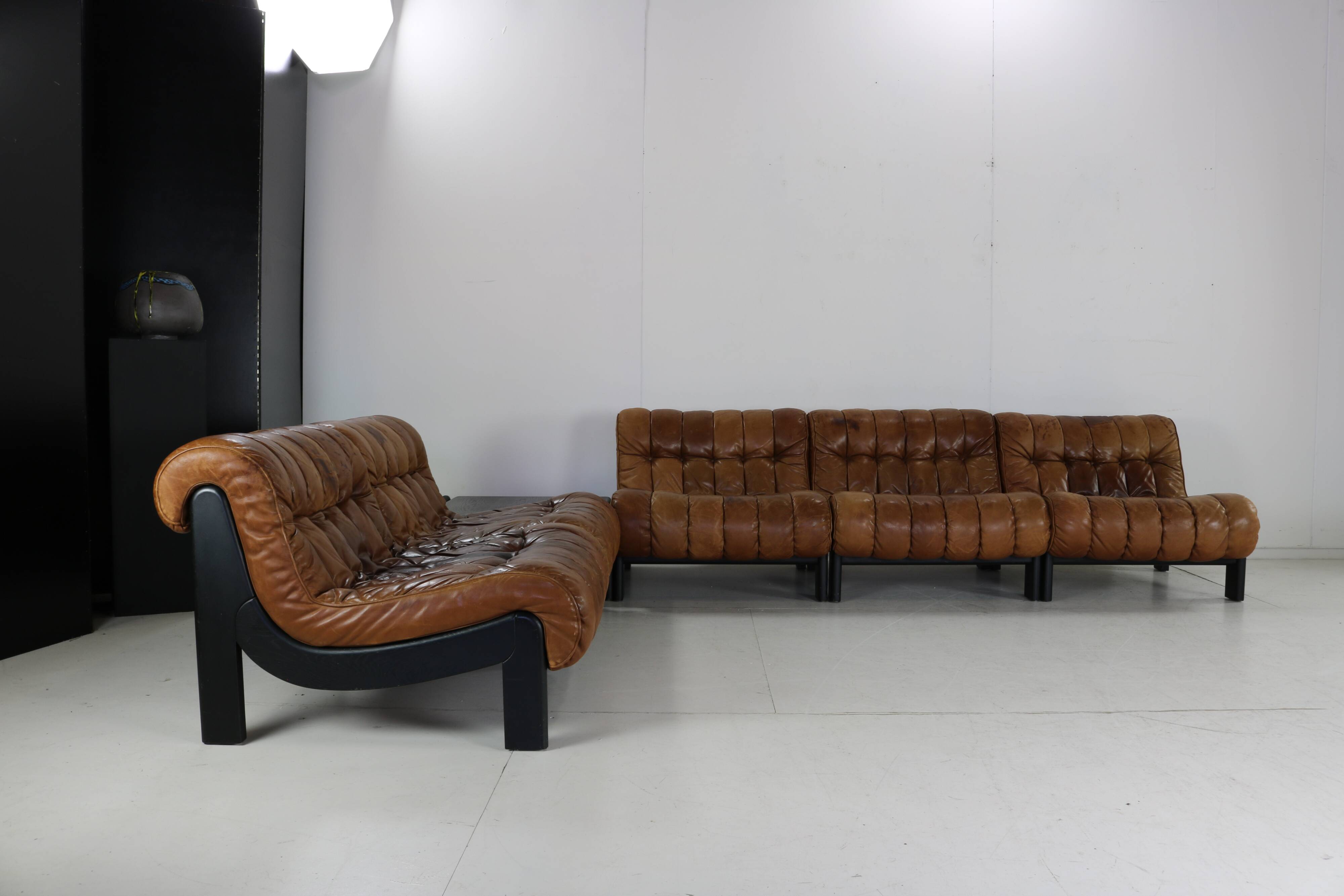 70s living room set in cognac brown leather with black wenge wood frame