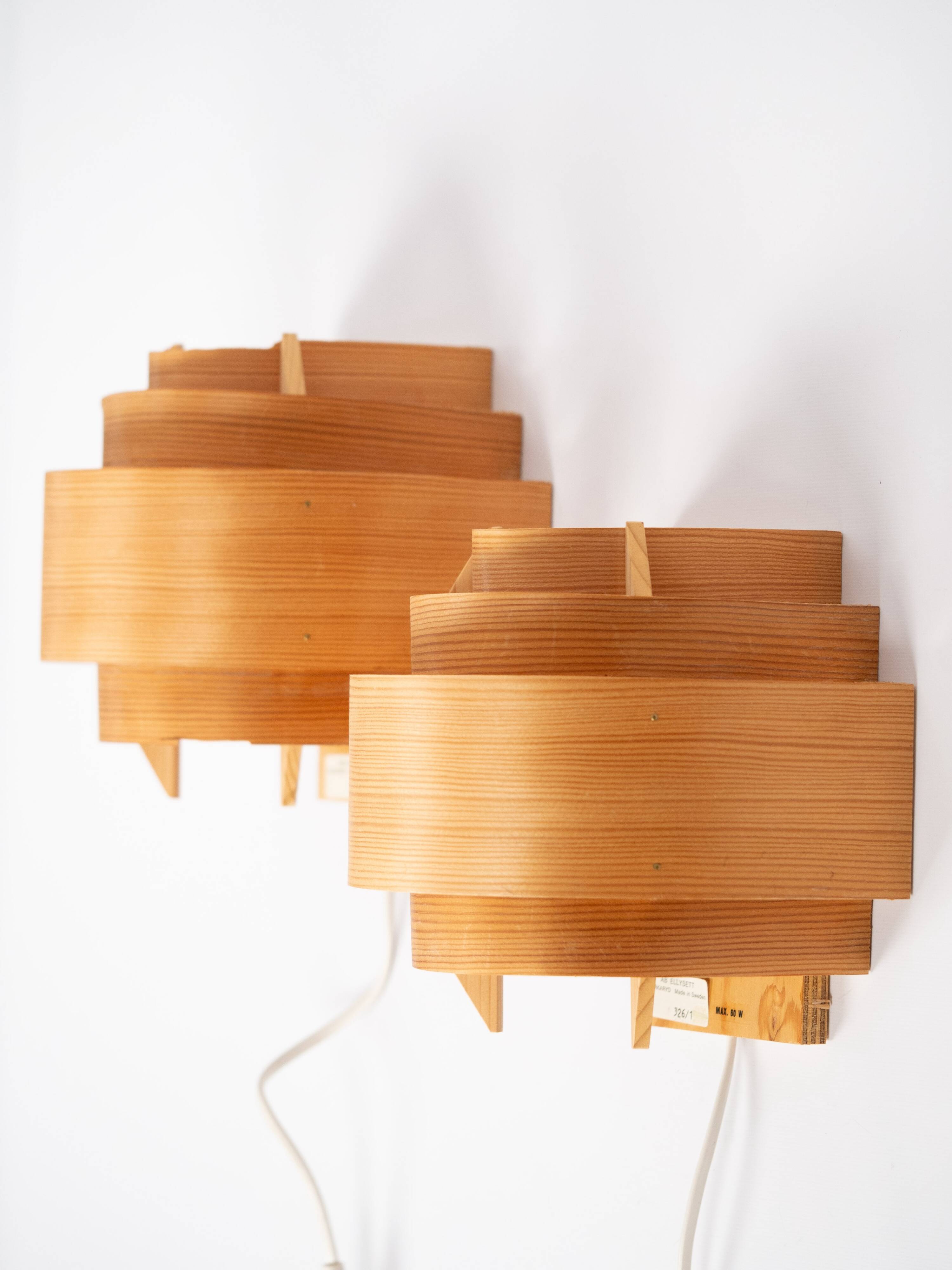 Pair of pine wood wall lamps V327 by Hans-Agne Jakobsson, AB Elysset, 1960s