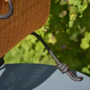 Wrought iron and rattan magazine/newspaper rack