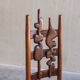 2 sculptural brutalist high-back chairs