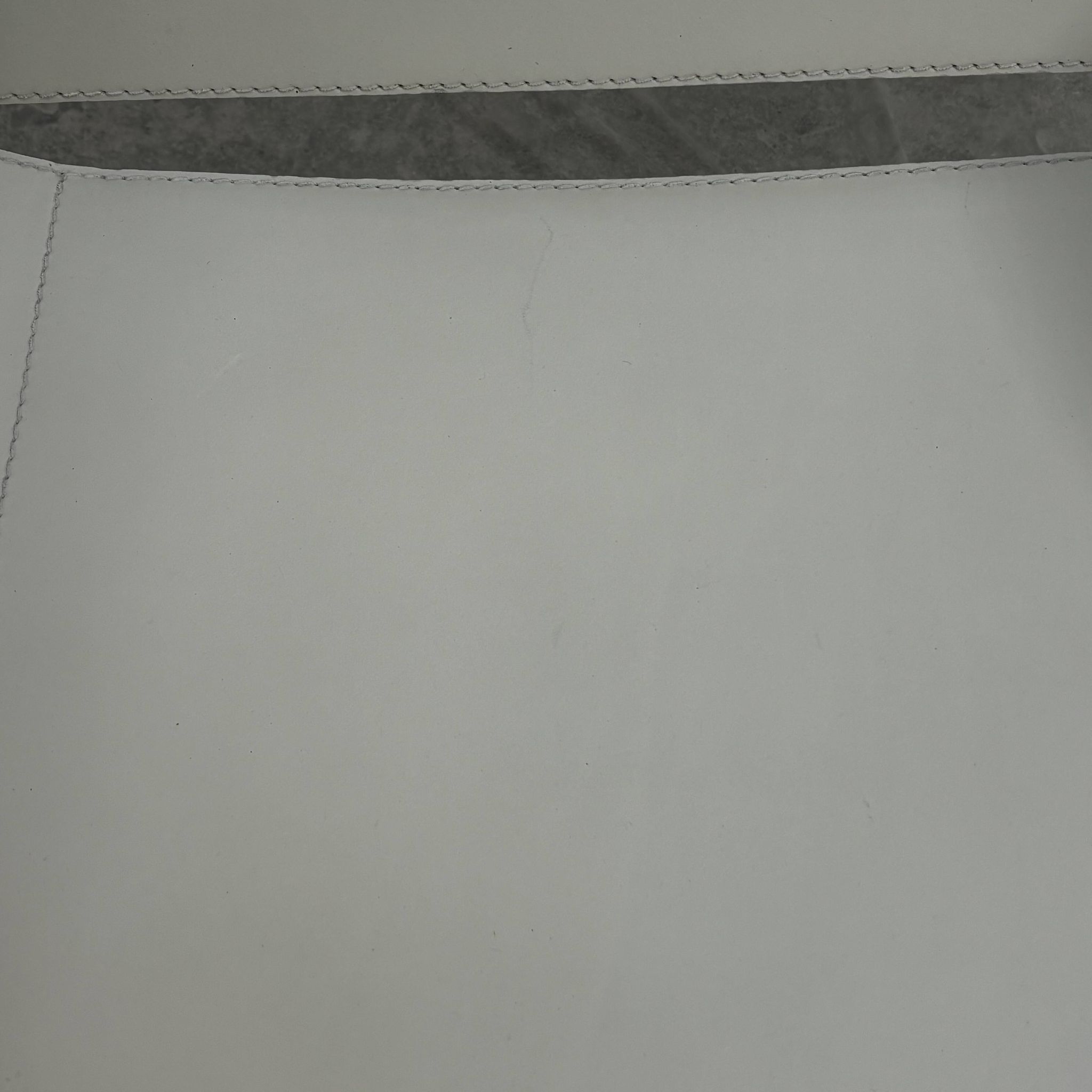 "Wassily" armchair by Marcel Breuer for Gavina in white leather.