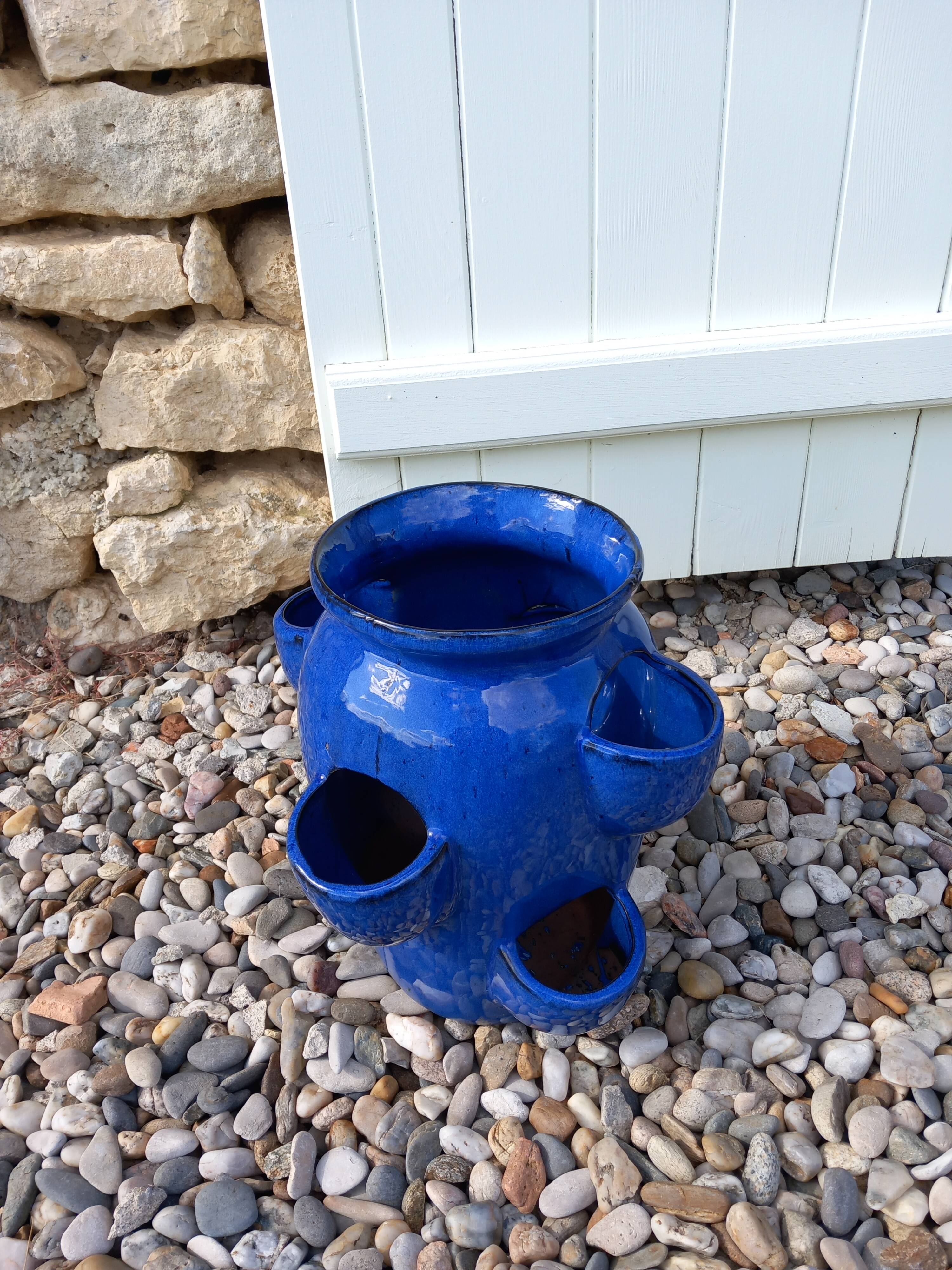 Blue glazed terracotta strawberry pot