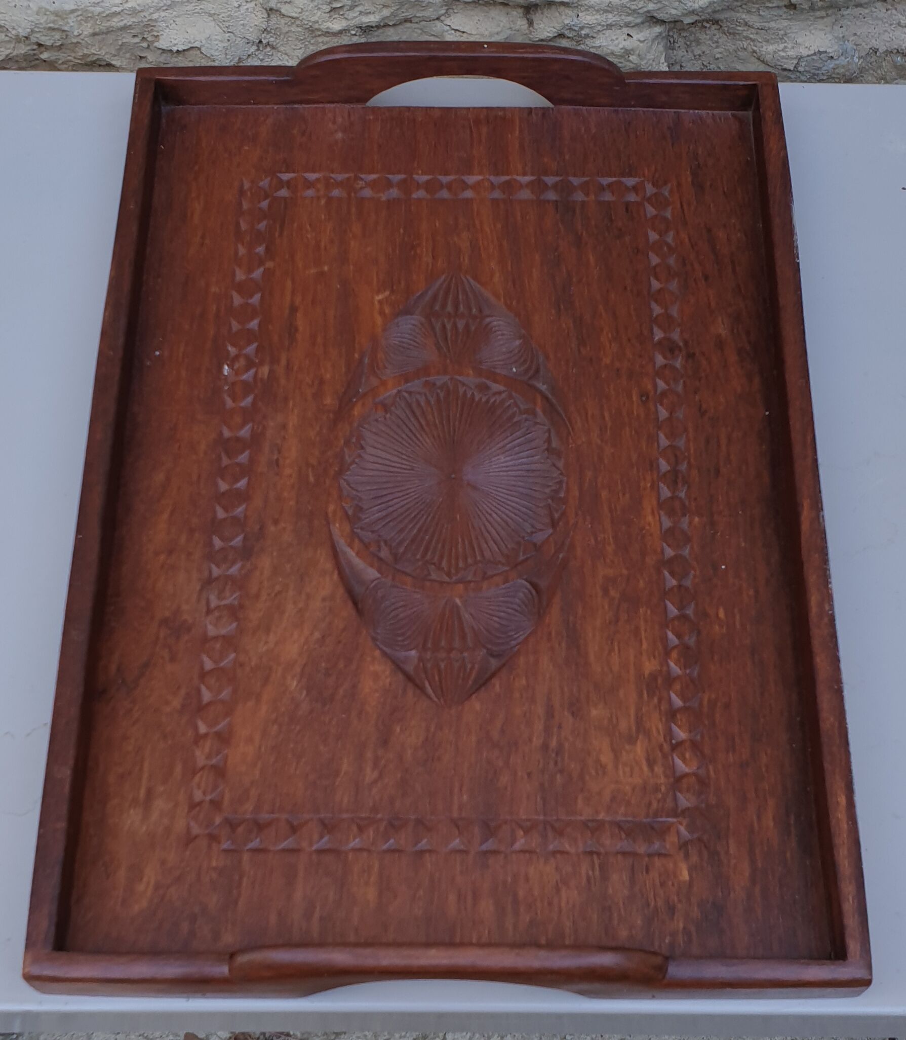 Ancient carved wooden tray
