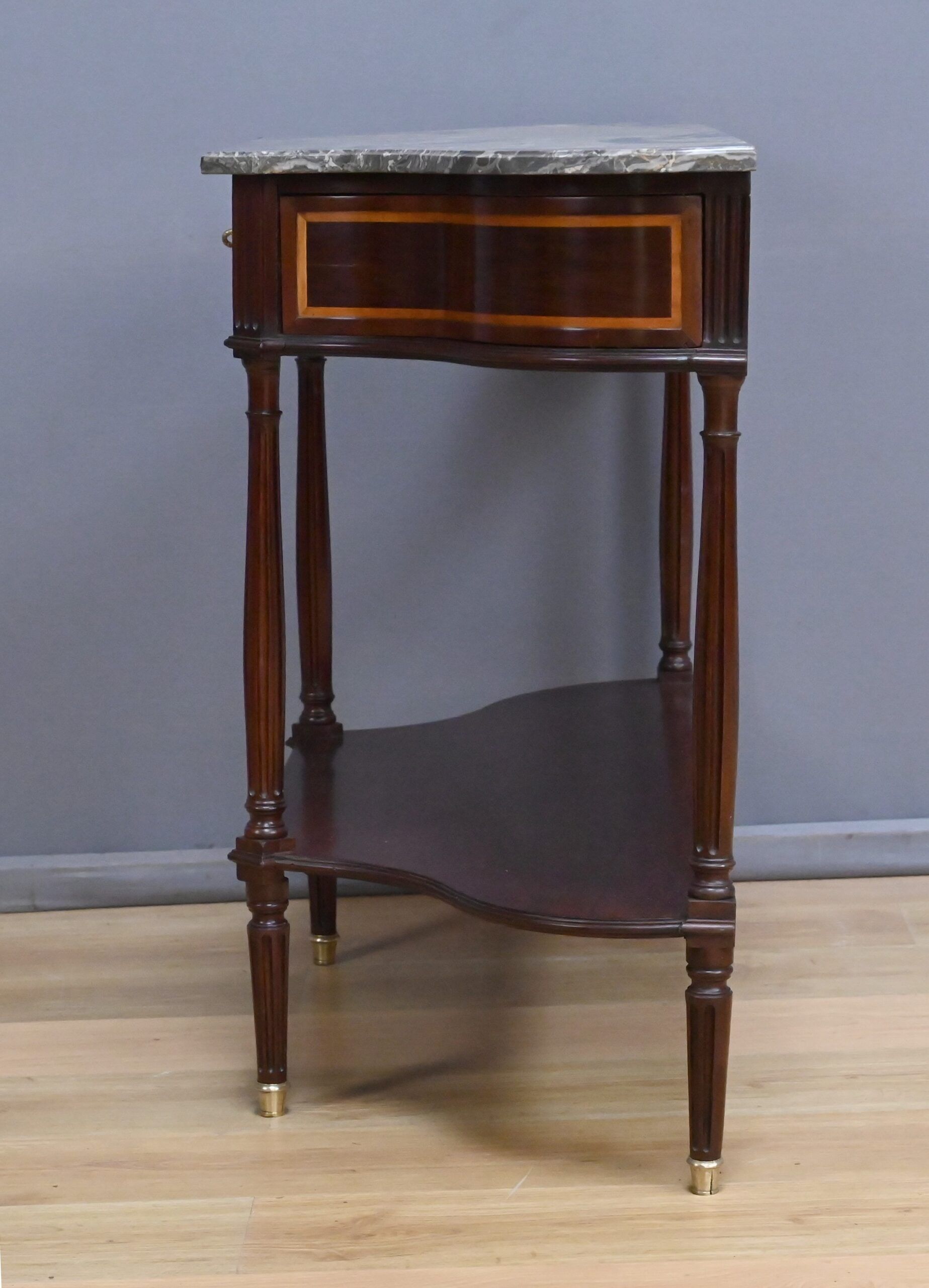 Console in mahogany and marble, Louis XVI period – late 18th century.