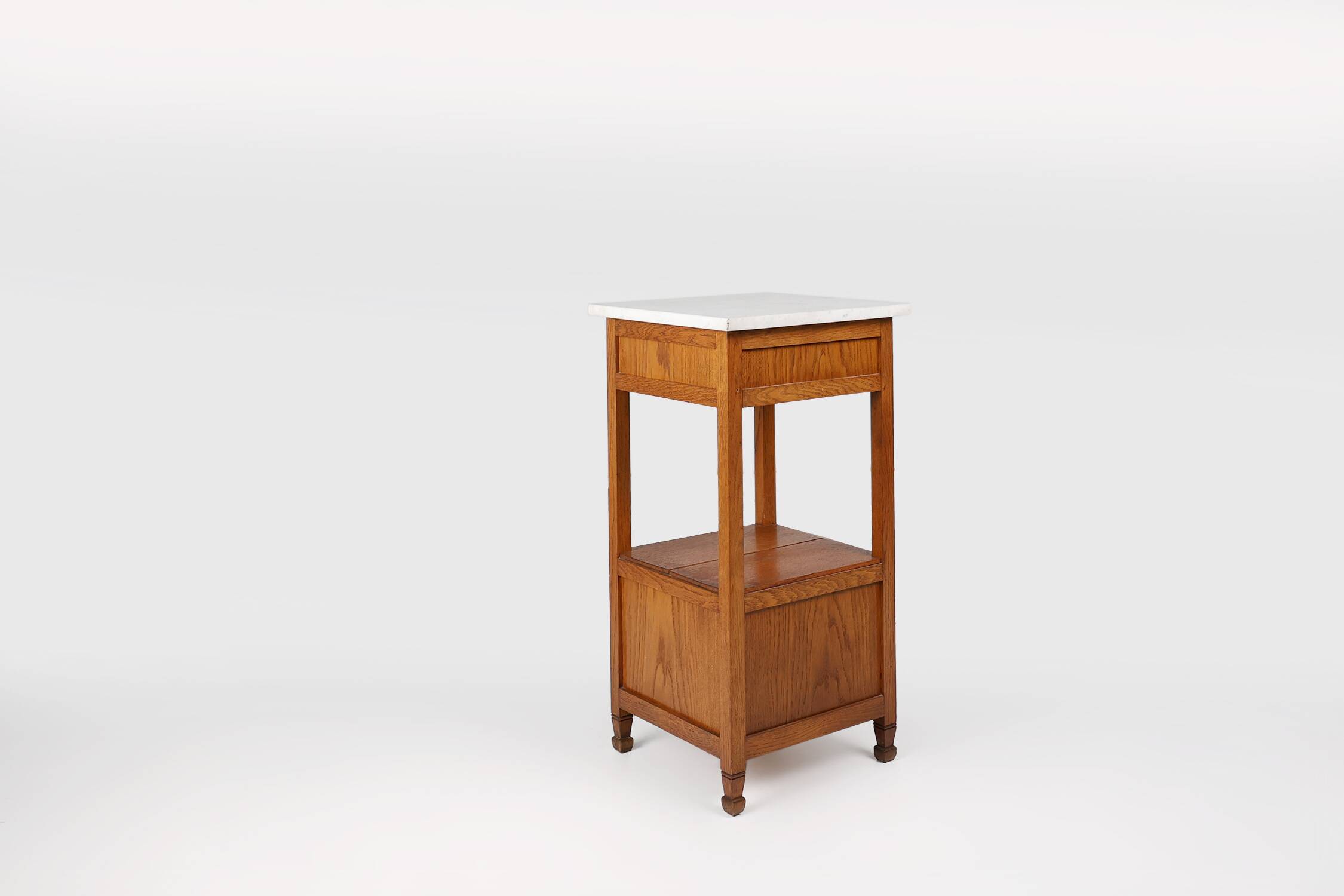 French Art Deco bedside table with a Carrara marble top, circa 1920.