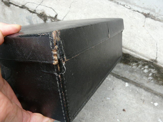 Leather suitcase with baron's crown and mw monogram