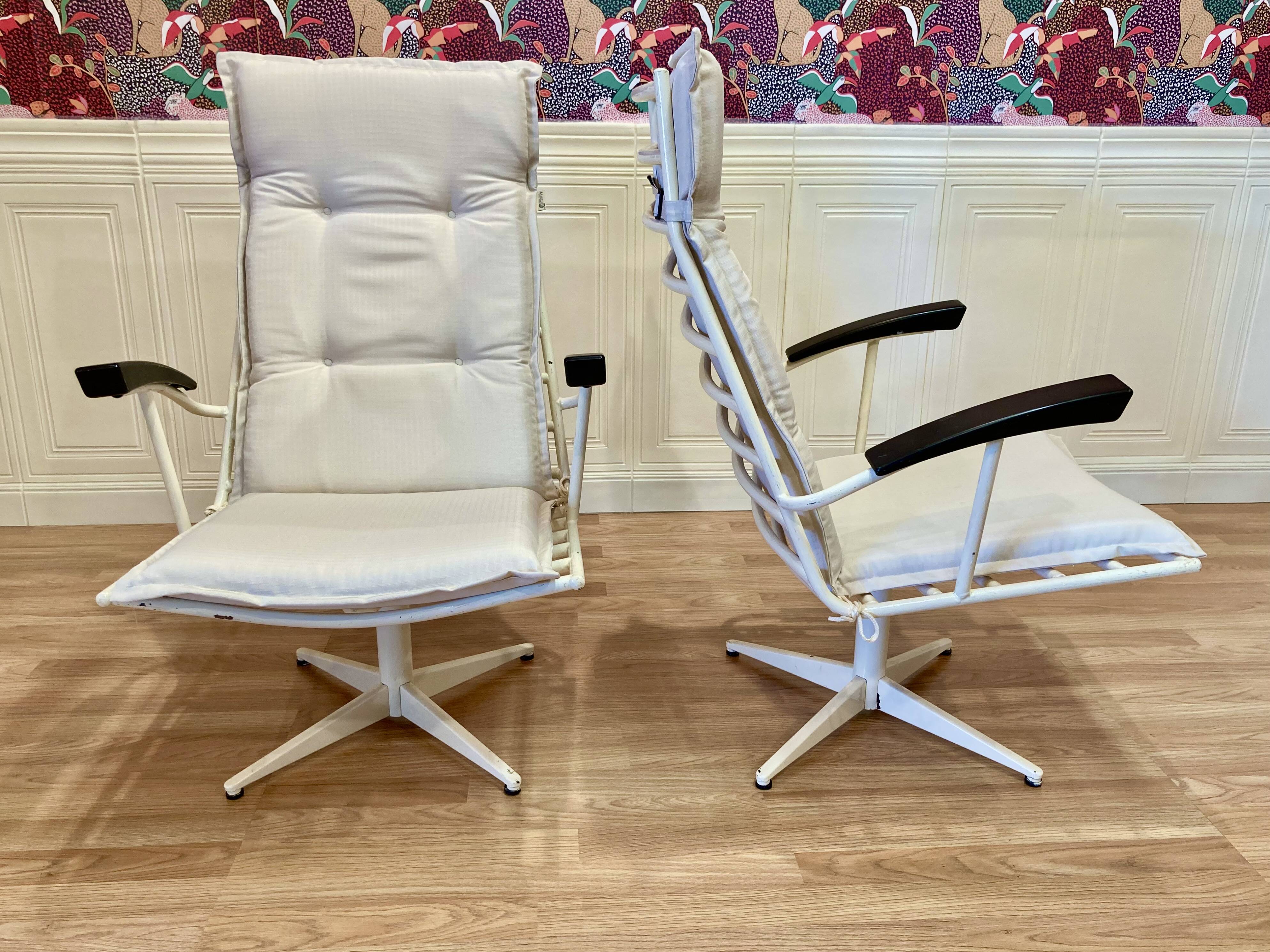 Pair of metal and Bakelite armchairs, 1960s design.