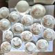 Antique iron earthenware plates accompanied by dishes