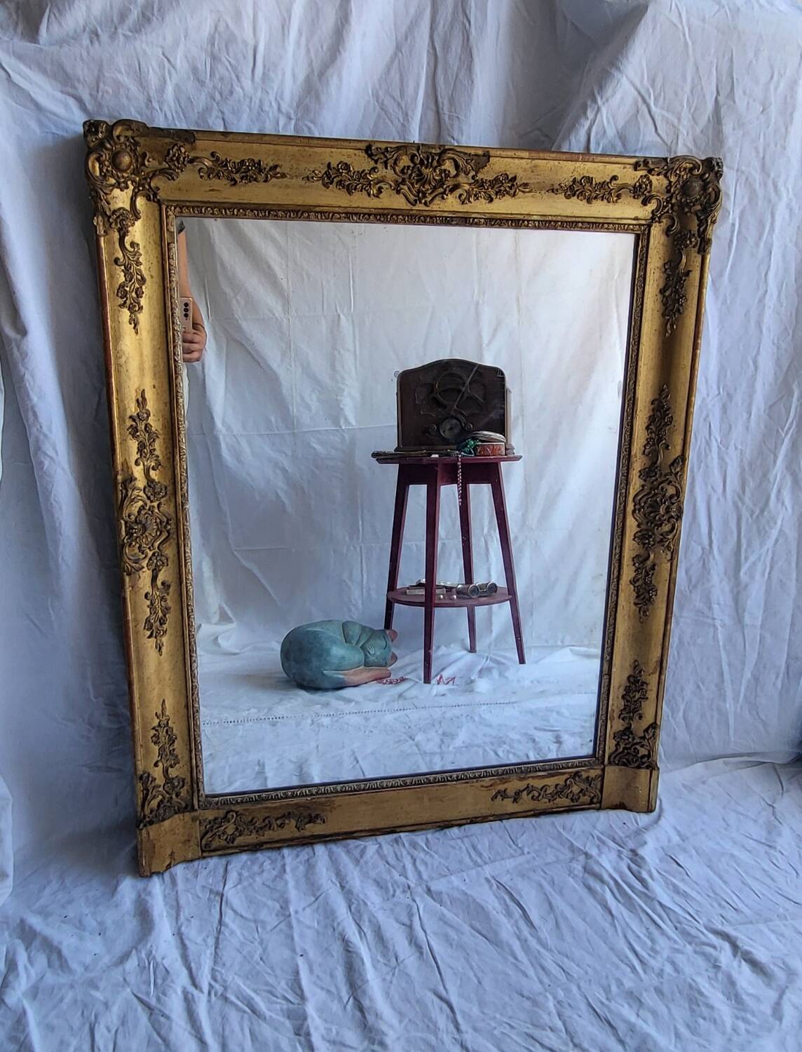 Antique Louis Philippe style gilded mirror decorated with floral motifs