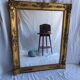 Antique Louis Philippe style gilded mirror decorated with floral motifs