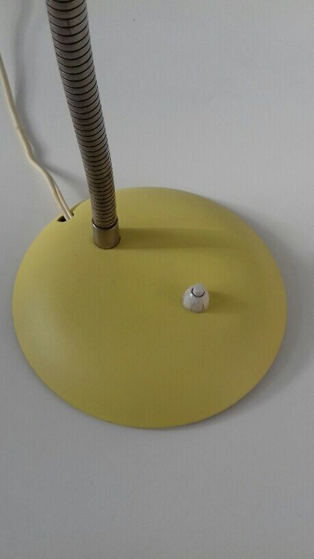 Vintage yellow lamp typical of the 1950s