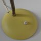 Vintage yellow lamp typical of the 1950s