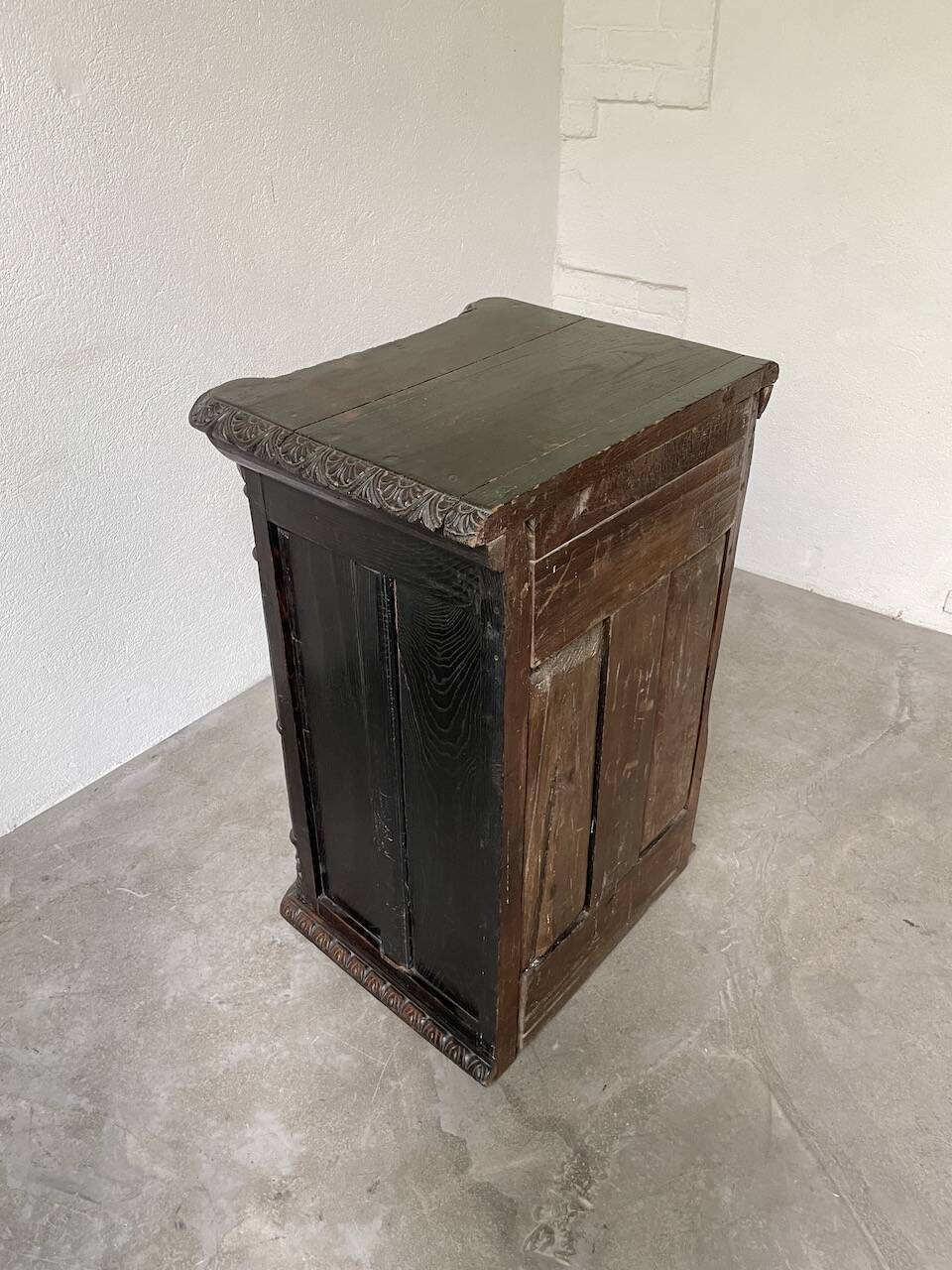 19th century chest of drawers in carved blackened pine