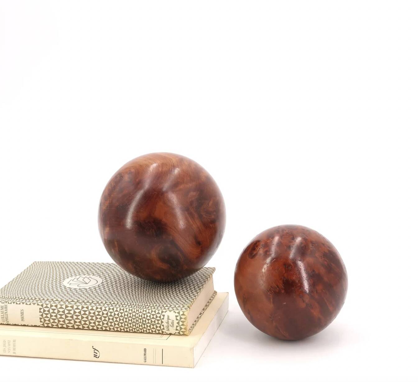 Sculptures of spheres carved in elm burl wood