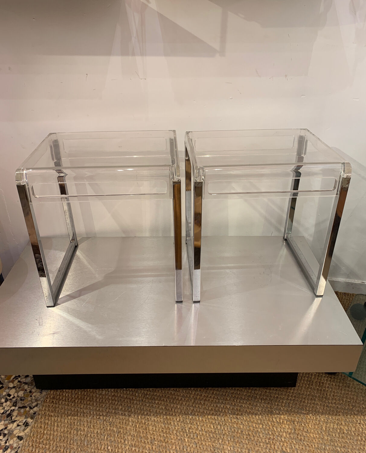 Pair of vintage chrome and acrylic glass bedside tables
