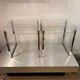 Pair of vintage chrome and acrylic glass bedside tables