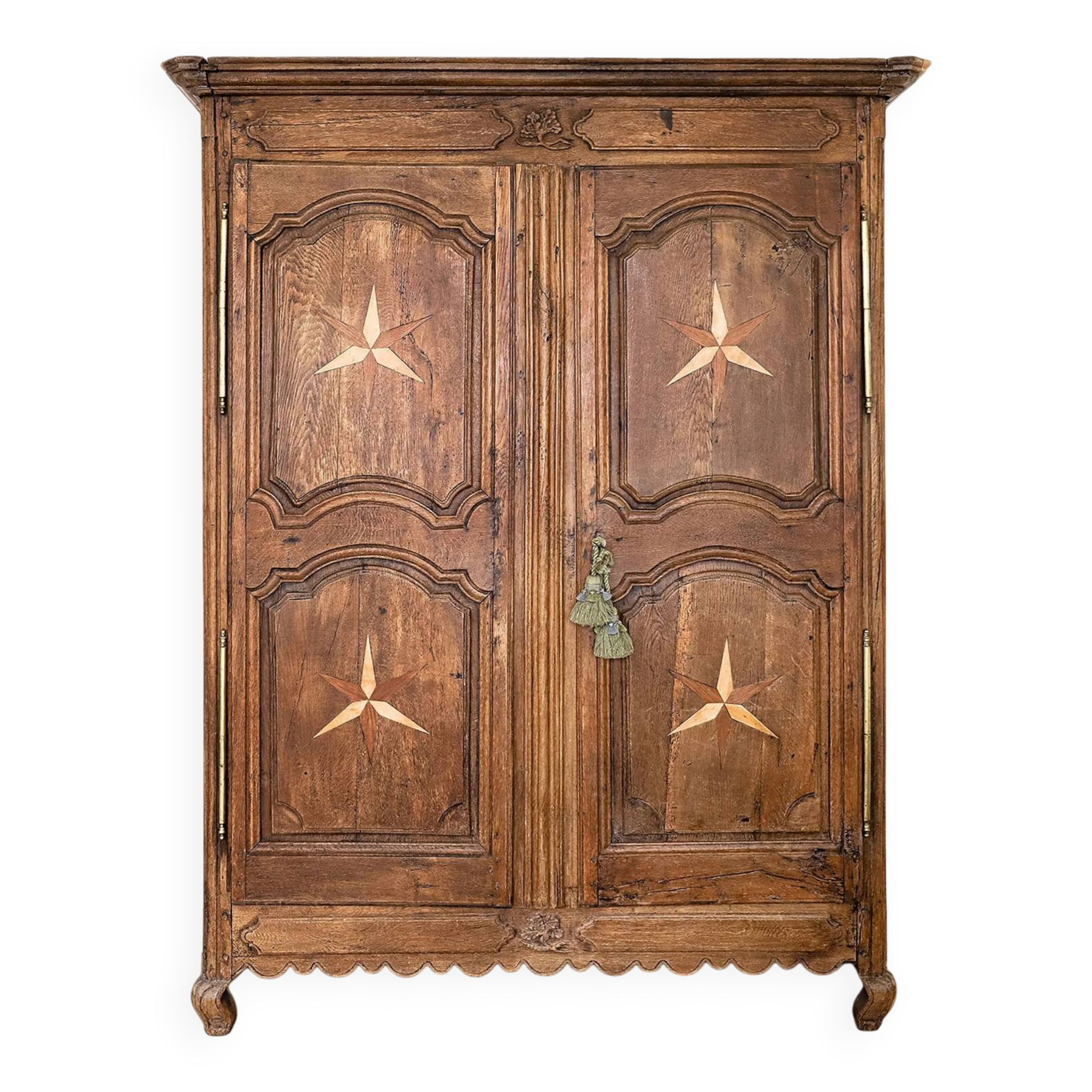 Antique French rustic wardrobe with star inlays.
