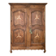Antique French rustic wardrobe with star inlays.