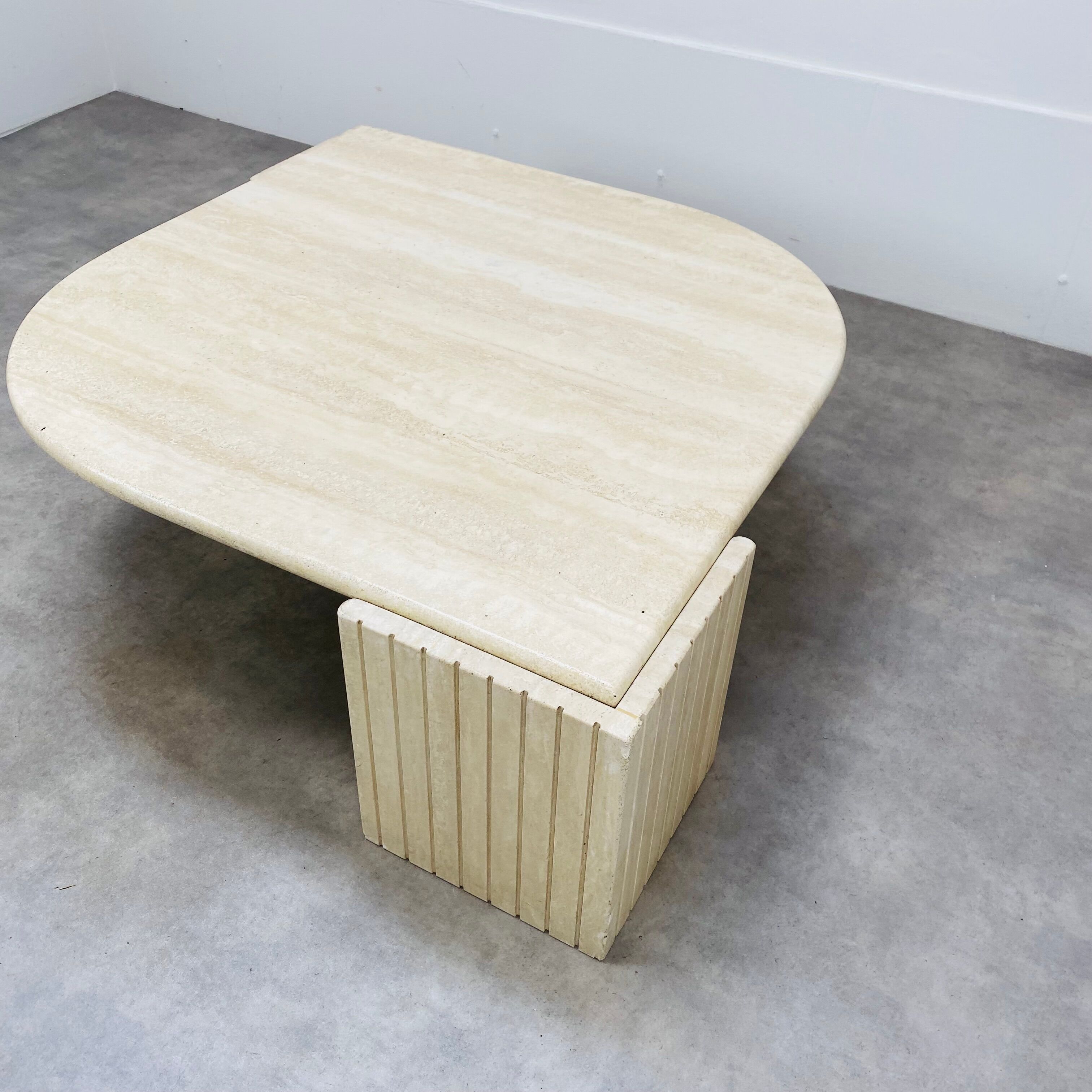 Travertine eye coffee table Roche Bobois