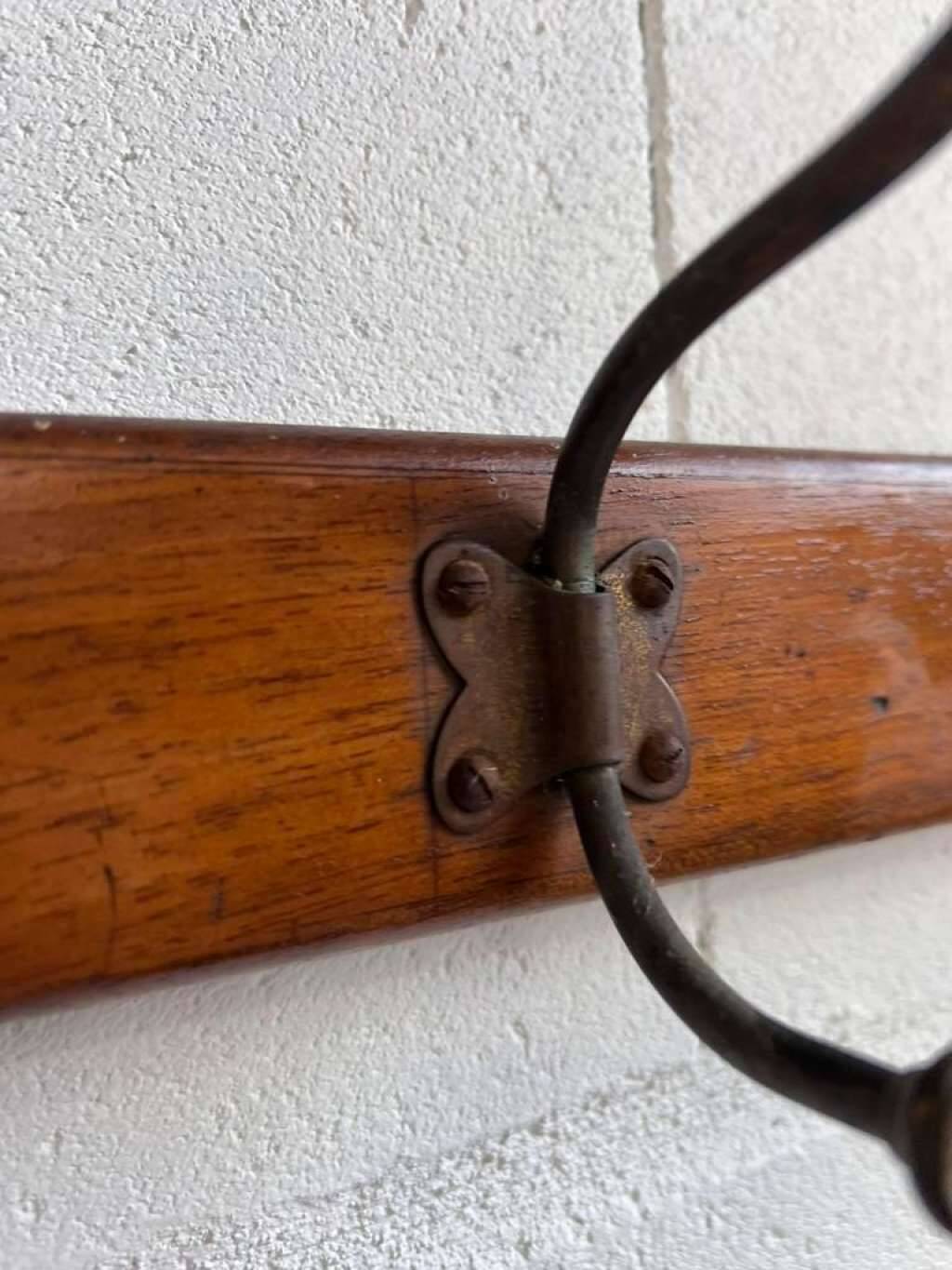 Vintage industrial wooden coat rack with porcelain hooks