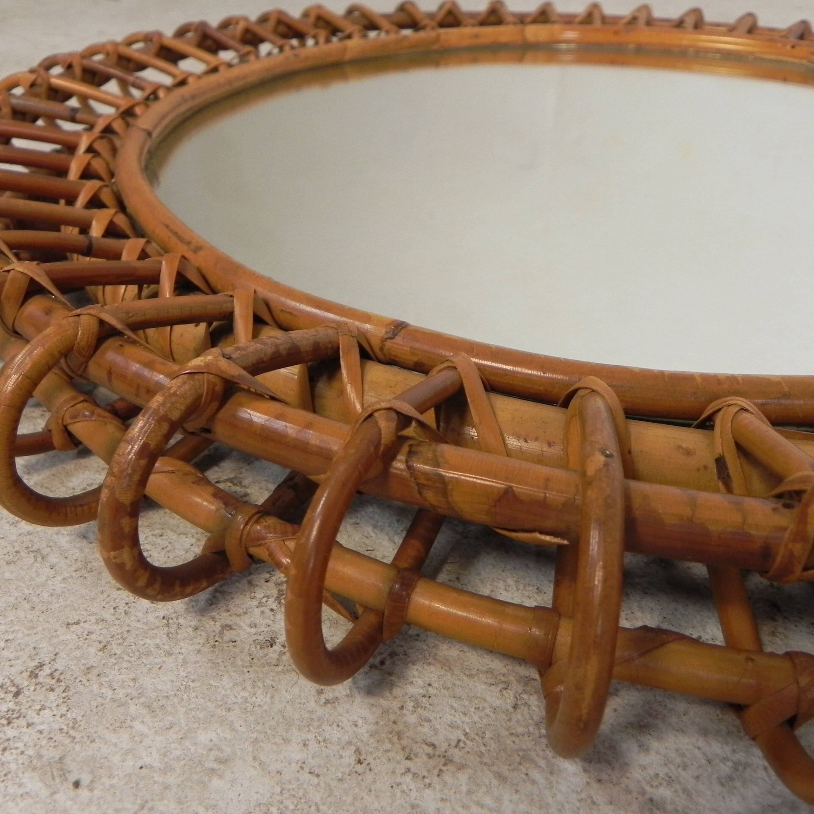 Round vintage mirror with bamboo edge