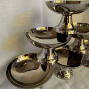 Set of 6 stainless steel ice cream bowls by Guy Degrenne with matching spoons.